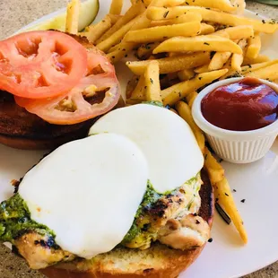 Chicken and pesto sandwich with rosemary garlic fries