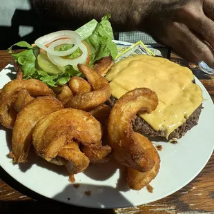 Half pound cheeseburger (they serve it open face so you can add your condiments before closing the bun) and fries.