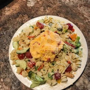 a plate of pasta salad