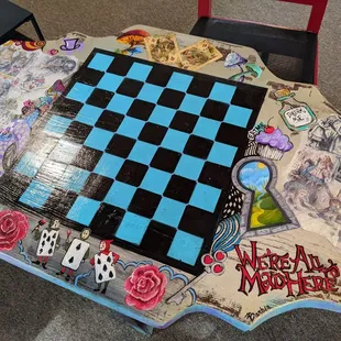 a table with a chess board on it