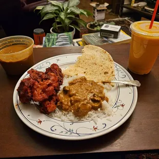 Lamb Korma over basmati rice with Cauli Manchurian and Mango Lassi