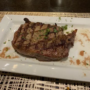 a piece of steak on a plate