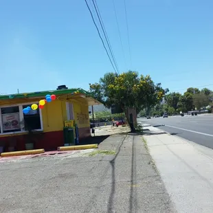 Outside in the parking lot right along 7th St.