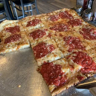 16" Old Fashioned Pan Pizza with 2 pieces missing &amp; added red sauce