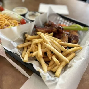 Hot and sweet bbq wings and fries