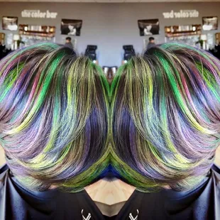 She wanted something exotic, colorful, and bright. Mandy made this custom color of neon green, yellow, blue, purple and hot p...