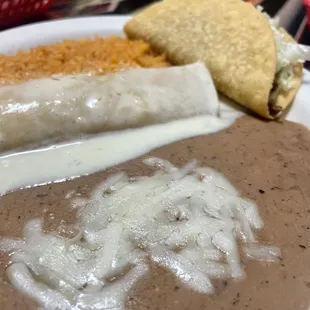 Lunch chicken enchilada w hard beef taco