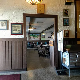 In takeout waiting area peering into dining area