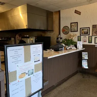 Jan 2020- facing checkout. The original owners photo on the wall.