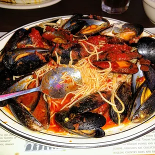 Muscles in red sauce over angel hair-- best anywhere!