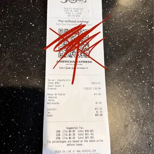 a receipt with a red marker