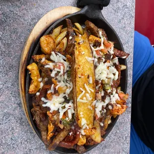 a skillet of food on a table