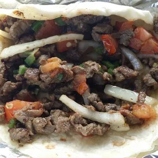 Steak ranchero. Grilled onions, tomatoes, jalapeño!