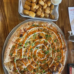 a pizza with a spiral design