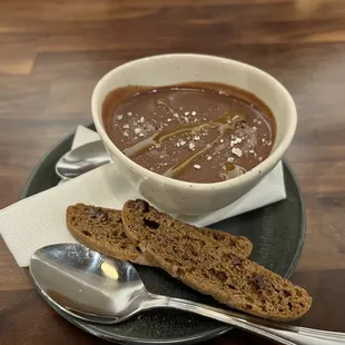 a bowl of soup and bread