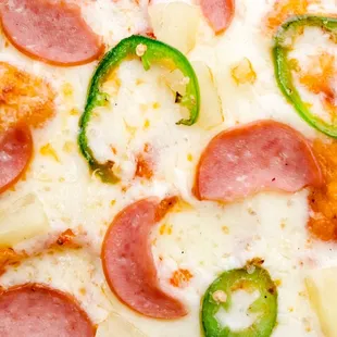 The Hawaiian- Ham, red sauce, pineapple, mozzarella, jalapeños