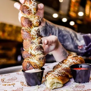 Seriously Twisted- famous dough, twisted, basted in garlic butter and served with marinara and Serious sauce