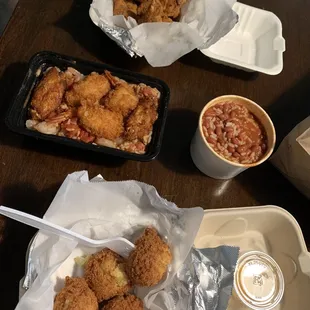 Jambalaya, fried chicken, hush puppies, red beans and rice.