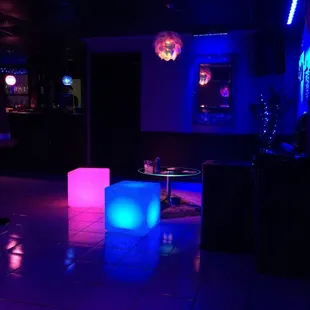 a brightly lit room in a nightclub