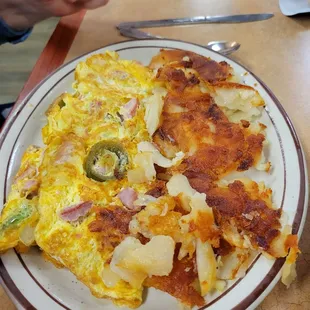 Omelet and fried potatoes.