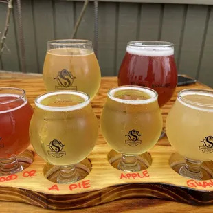 Cider flight and some single glasses of cider