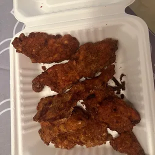 These are chicken tenders.   They are burnt, hard, and dry as cardboard.