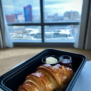 Croissant with jam &amp; butter. Fresh &amp; delicious.