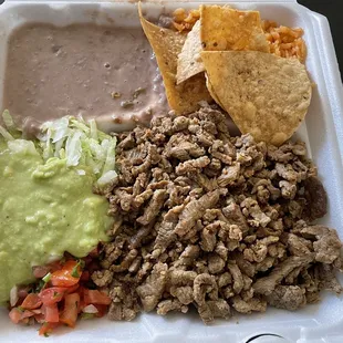 Carne asada plate with soupy beans, dry rice and flavorless carne asada