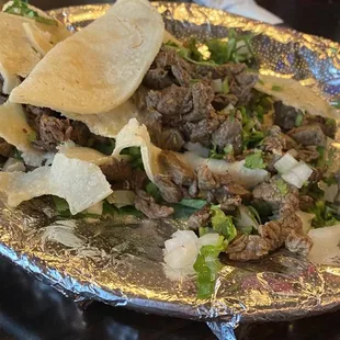 Tacos with tortillas that fell apart.