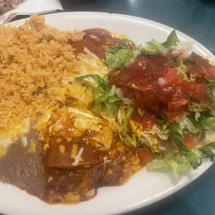 Cheese enchilada and bean tostada with rice and beans