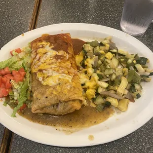 Bean and cheese chimichanga with red and green sauce  and Mexican style vegetables