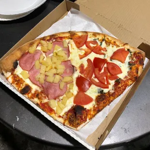 a pizza in a pizza box