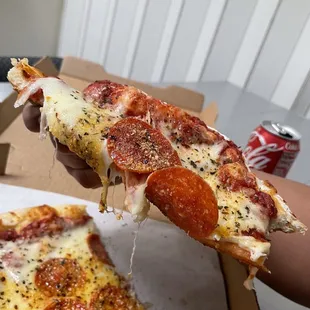 a slice of pepperoni pizza