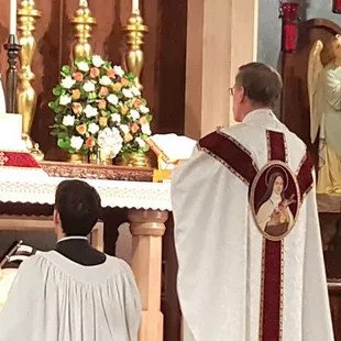 Priest and seminarian