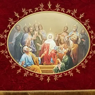The front of the altar cloth depicts the descent of the Holy Spirit upon the Apostles in the form of tongues of fire (handpainted on cloth)