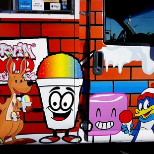 an ice cream truck with a cartoon character on the side