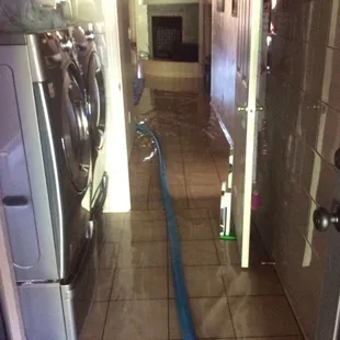 (B) This the aftermath of a broken toilet supply line. Thankfully SERVPRO of NE Tucson arrived shortly!