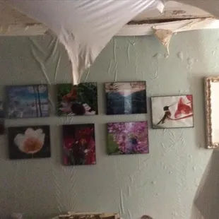 This is aftermath of a broken water line. In this picture, you can see a section of the living room wall of a downstairs unit...