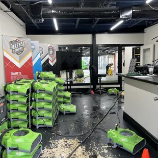 The main waterline into the building burst.  Lining up our air movers to start finish off the drying process.