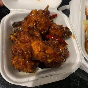 chicken wings in a styrofoam container