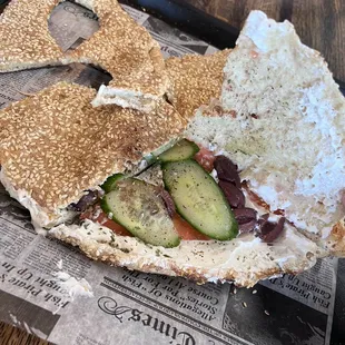 Labneh baladiyeh with zaatar, cucumber, tomato, and olives