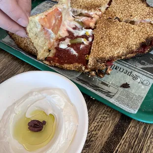 Soujouk with cheese, tomato, pickles, and corn