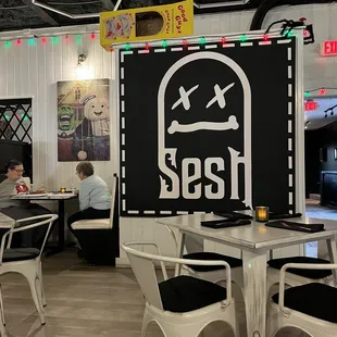 a man sitting at a table in a restaurant