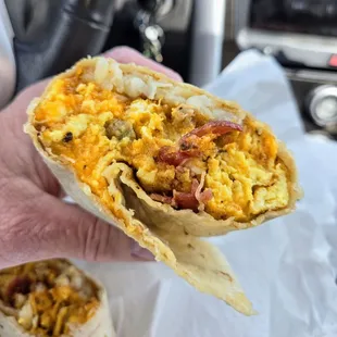 Breakfast burrito.  Sausage, bacon, egg, cheese, hash browns