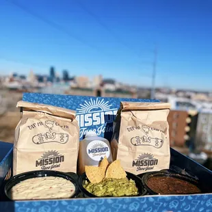 a box of chips and salsa