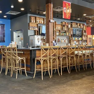 the bar with chairs
