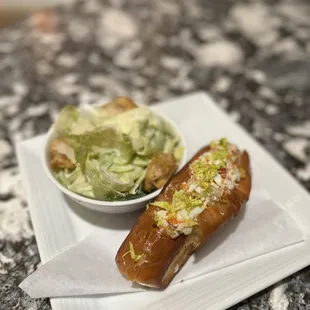 Lobster roll with Caesar salad
