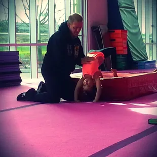 Azra with Coach Dan. Her first day at Gymnastics!