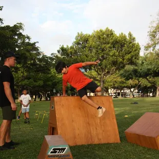 Vaulting over custom built boxes.