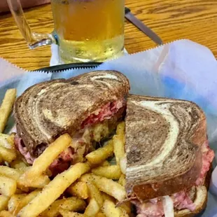 Perfect Reuben, crispy marble rye with perfect ratio of corned beef and kraut, Swiss cheese and just enough dressing